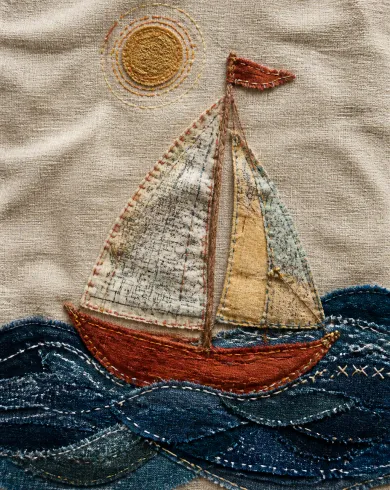 手工刺繡／布貼作品「地圖布帆船」，以刺繡布貼呈現主體、留白與真實手作痕跡。