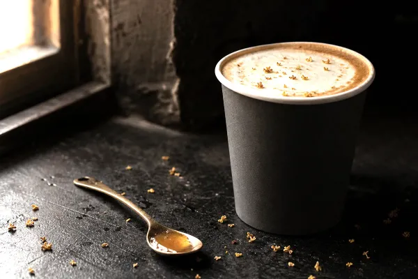 Osmanthus Au Lait, a finished drink served by Rhine Coffee